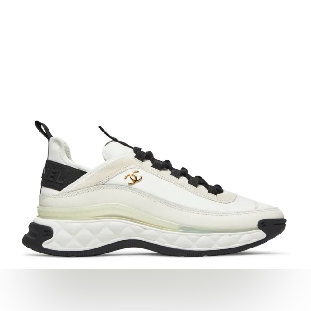 CHANEL Black and Cream Sneakers with Modern Design